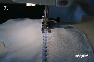 Coser piquillo babero